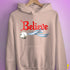 Believe Transgender Pride Jingle Bell Hoodie - Light Pink